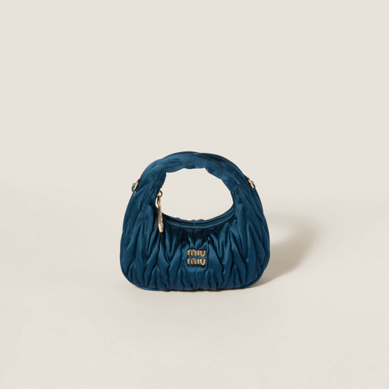 Wander matelassé satin mini-bag