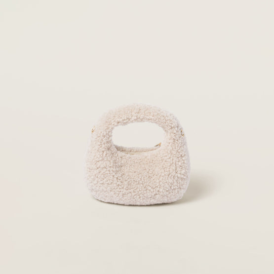 Wander shearling hobo bag with leather details
