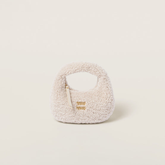 Wander shearling hobo bag with leather details