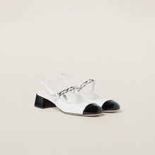 Two-tone patent leather slingback pumps