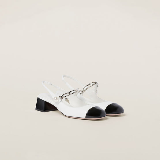Two-tone patent leather slingback pumps