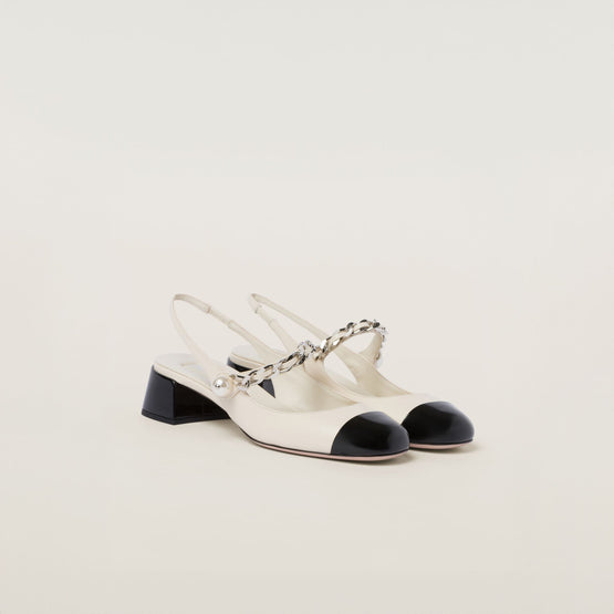 Leather and patent leather slingback pumps