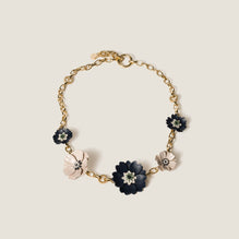 Metal and leather necklace
