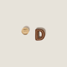 Leather and metal earrings