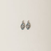 Metal earrings with crystals
