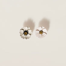 Metal and leather earrings