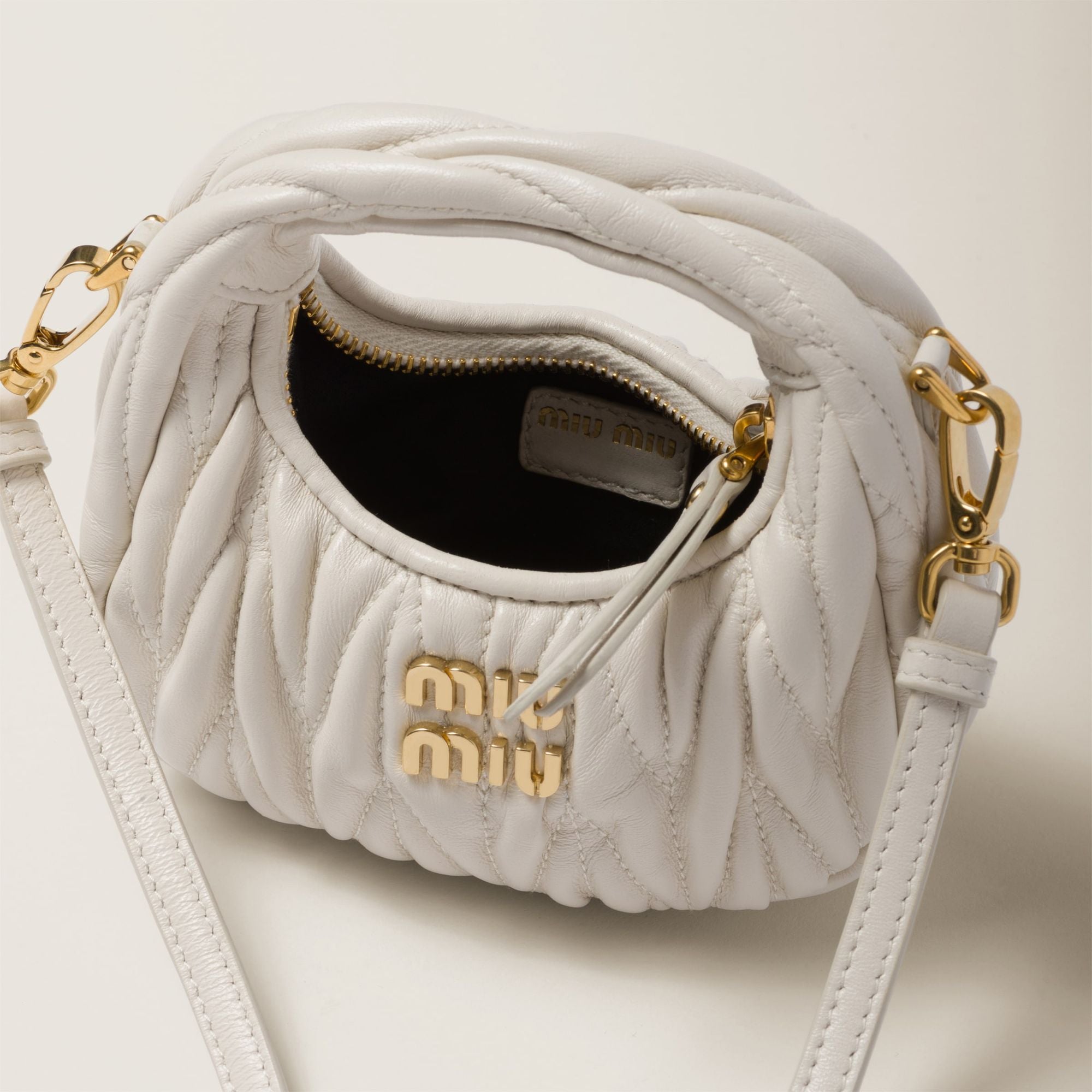 Women Wander Matelassé Nappa Leather Micro Hobo Bag - Bianco