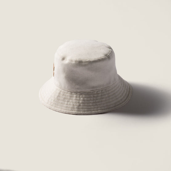Reversible hat with pouch