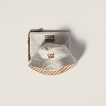 Reversible hat with pouch