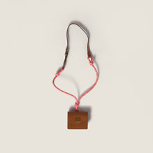 Leather and cord trick