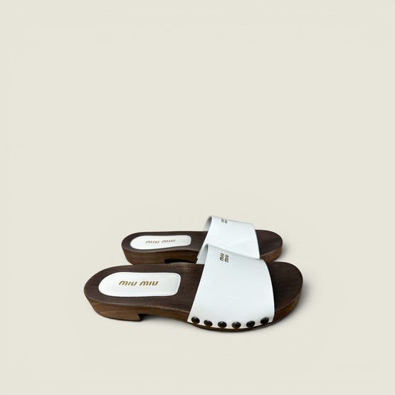 Patent leather clogs